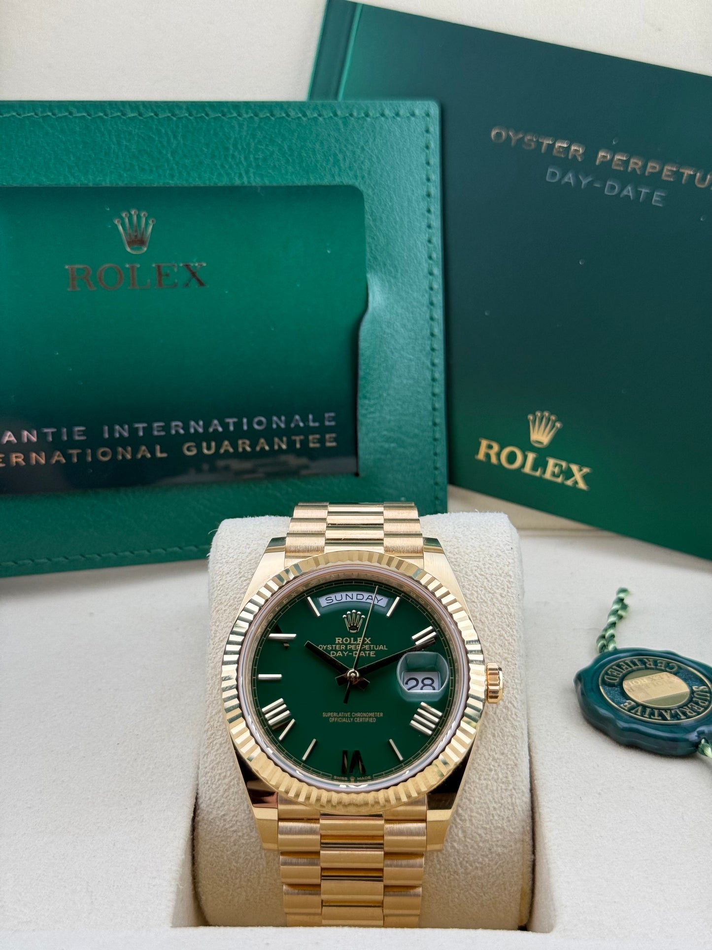 Rolex Day-Date 40 Green Roman “Money Green” Yellow Gold 228238